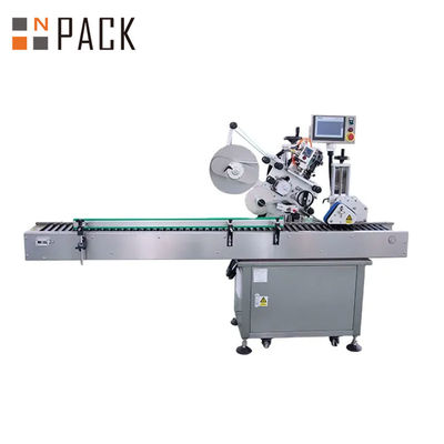 เครื่องติดป้ายน้ําผงริมฝีปากแนวราบอัตโนมัติ พร้อมควบคุม PLC